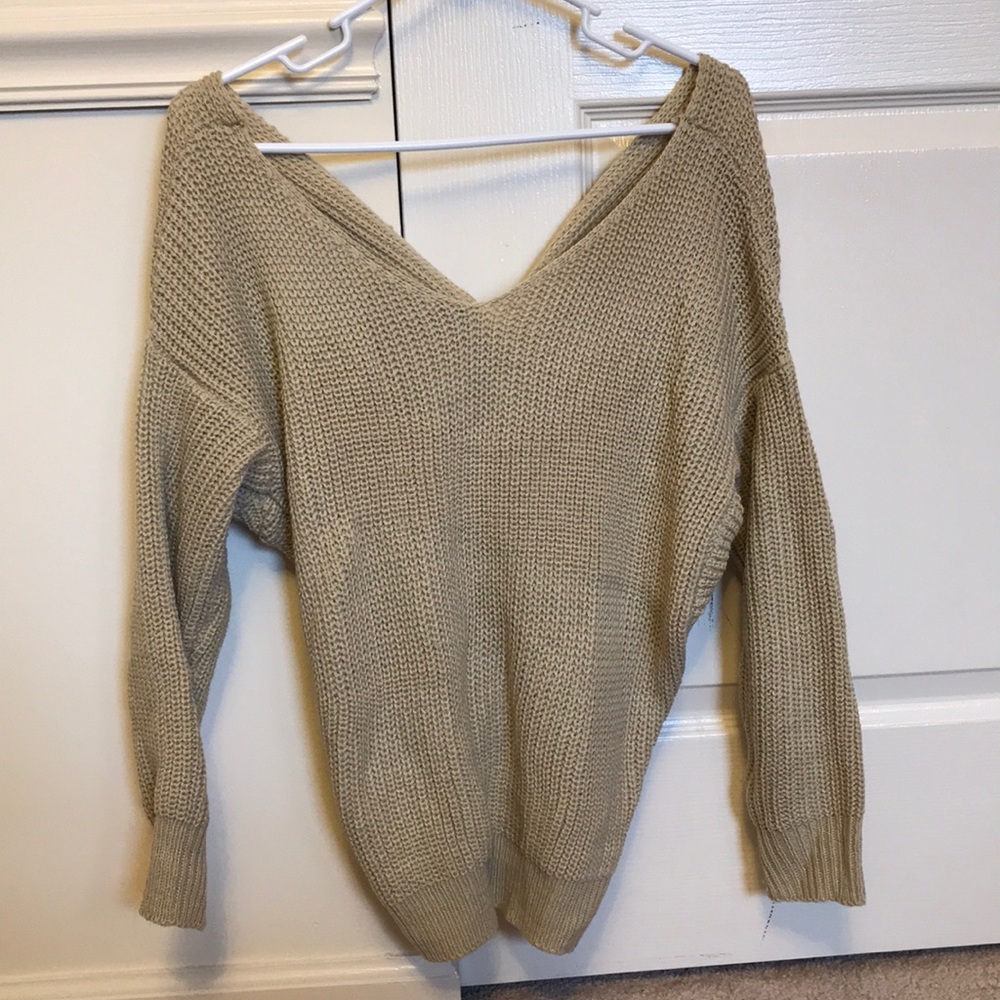 Sweater with twisted back